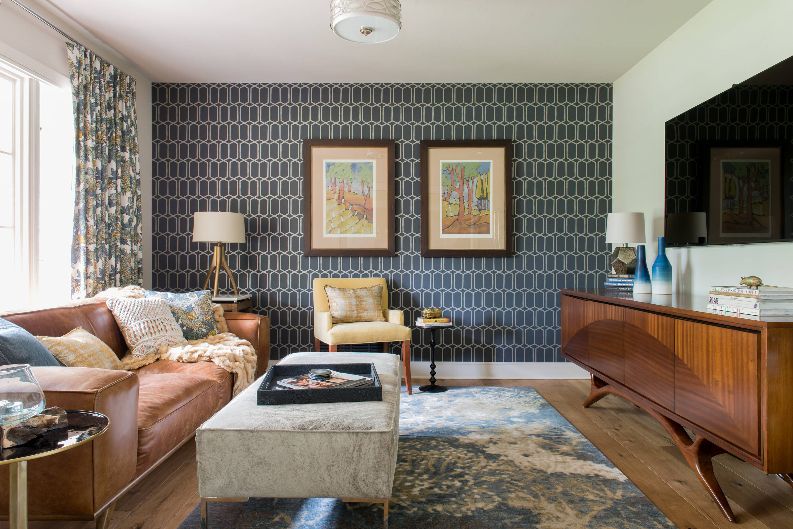 Finished residential interior with wallpaper and natural light
